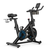 compact exercise bicycle with magnetic resistance and dumbbell rack for home cardio workout